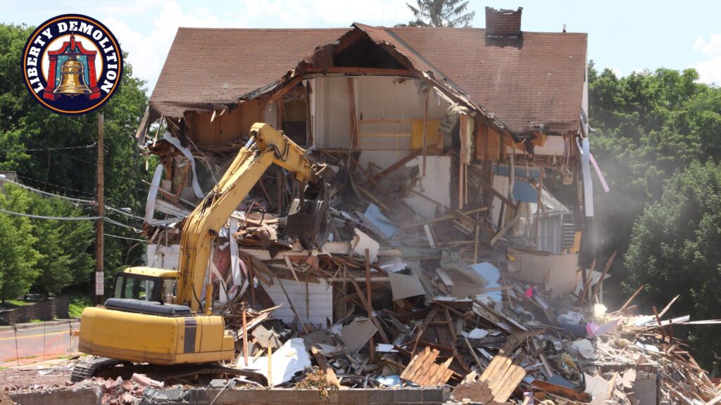 house demolition using heavy machine